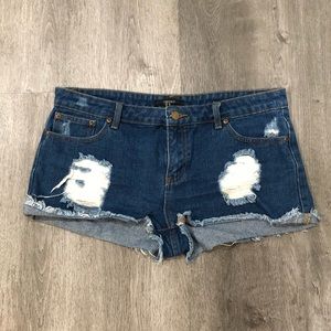 Destructed denim shorts